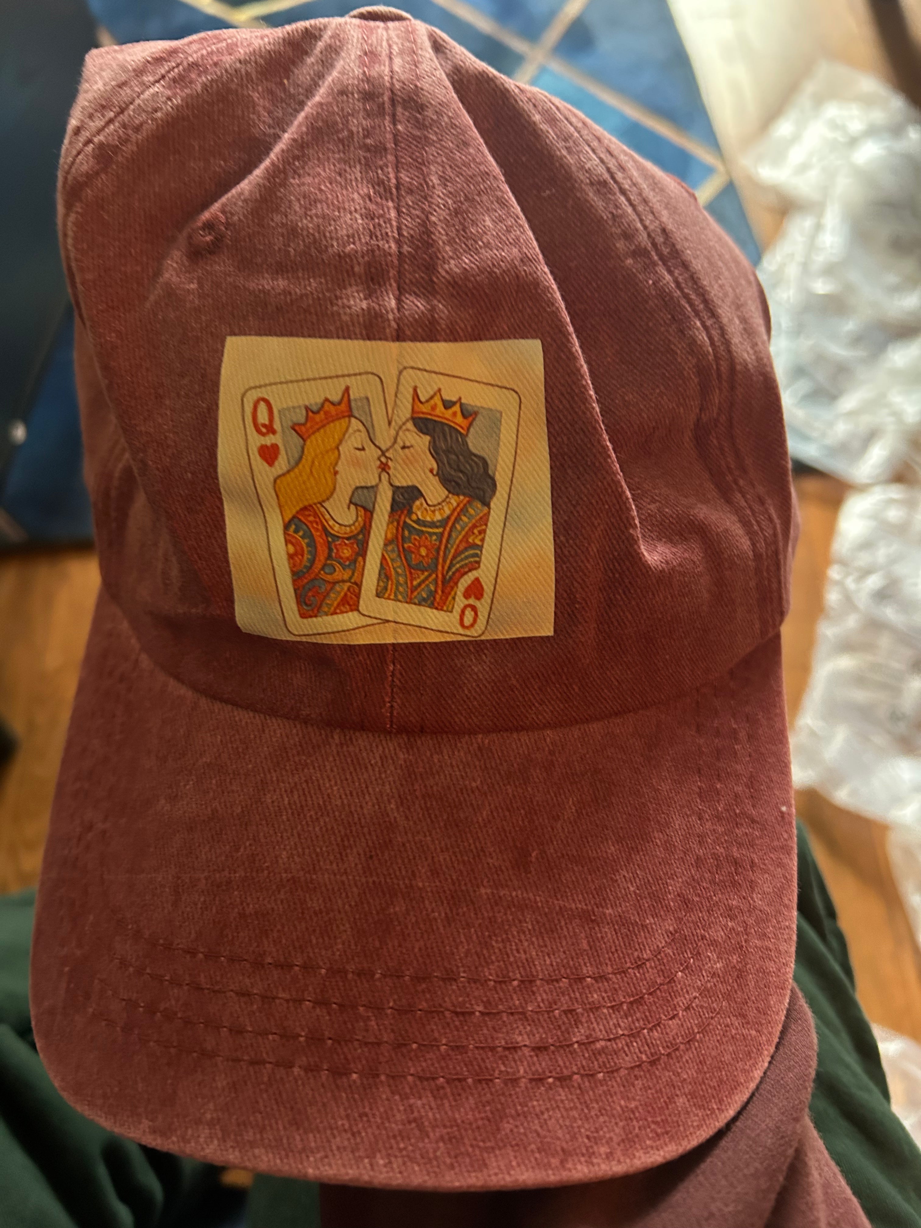 Two Queens kissing baseball cap
