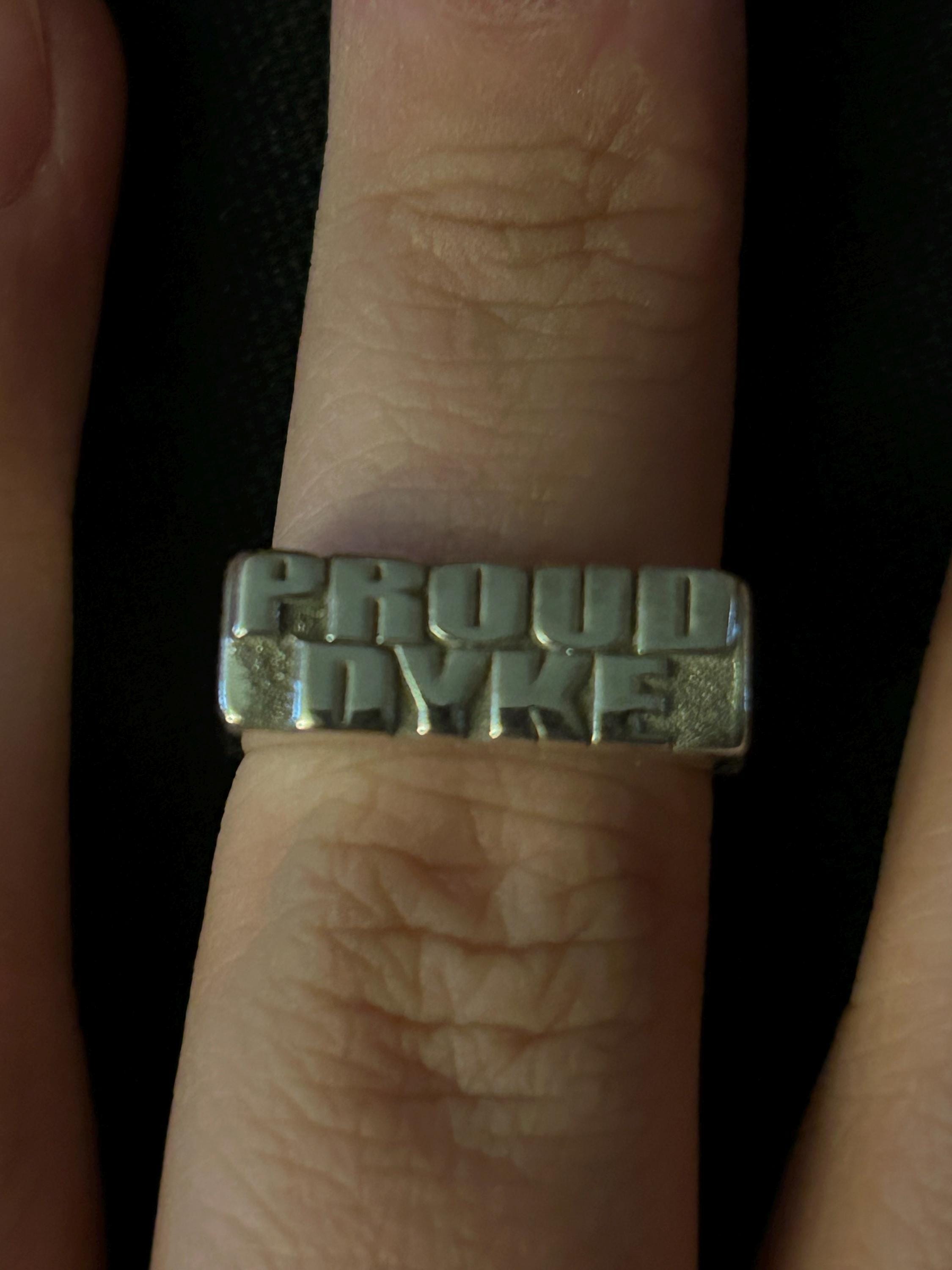 sterling silver proud dyke ring