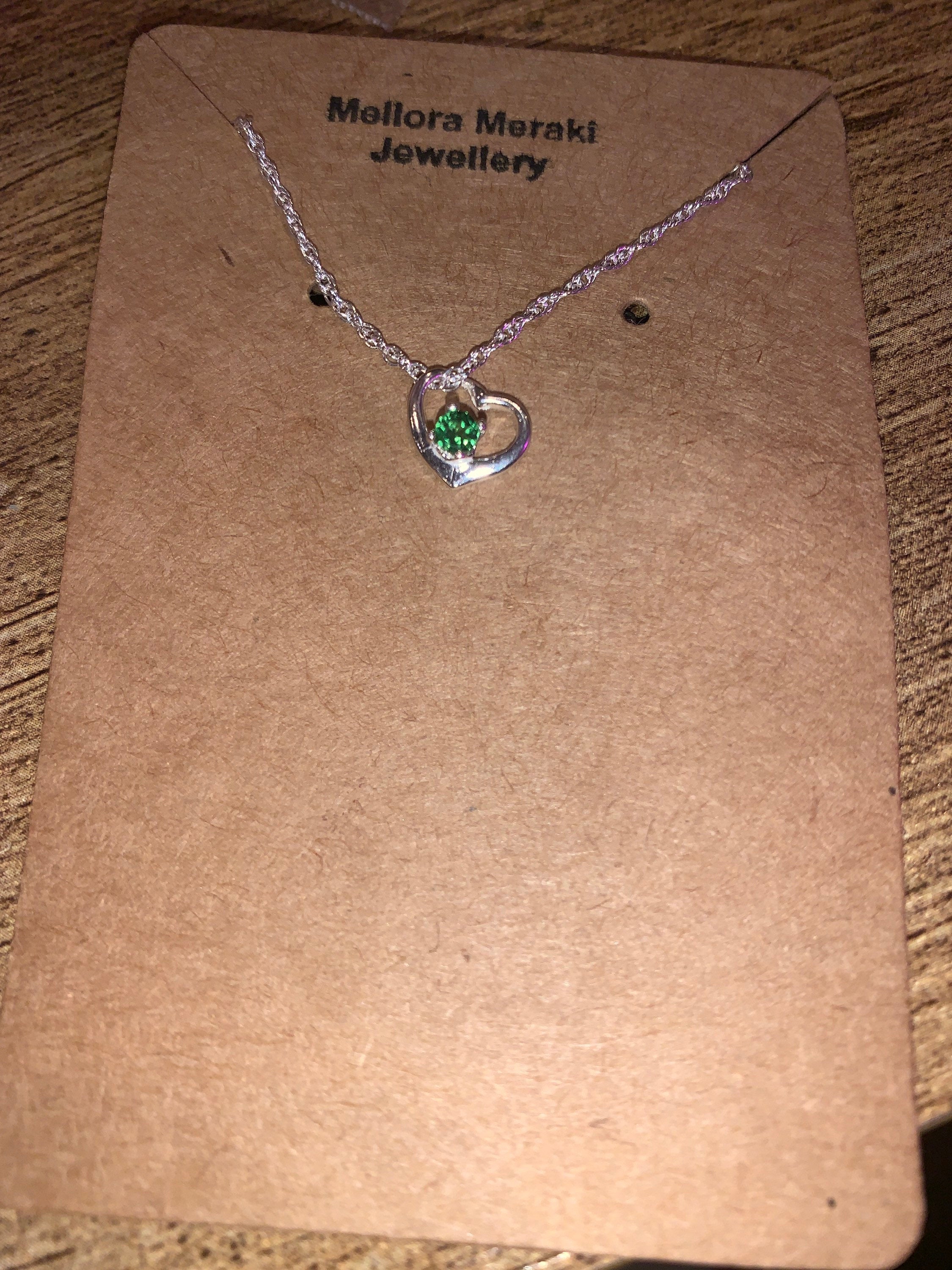 Sterling silver love pendant with Tsavorite
