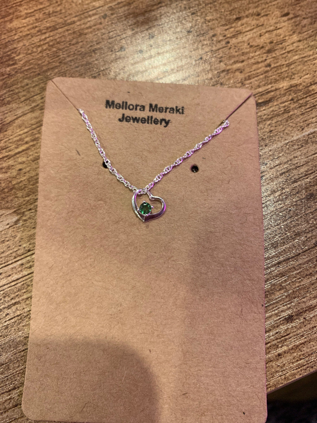 Sterling silver love pendant with Tsavorite